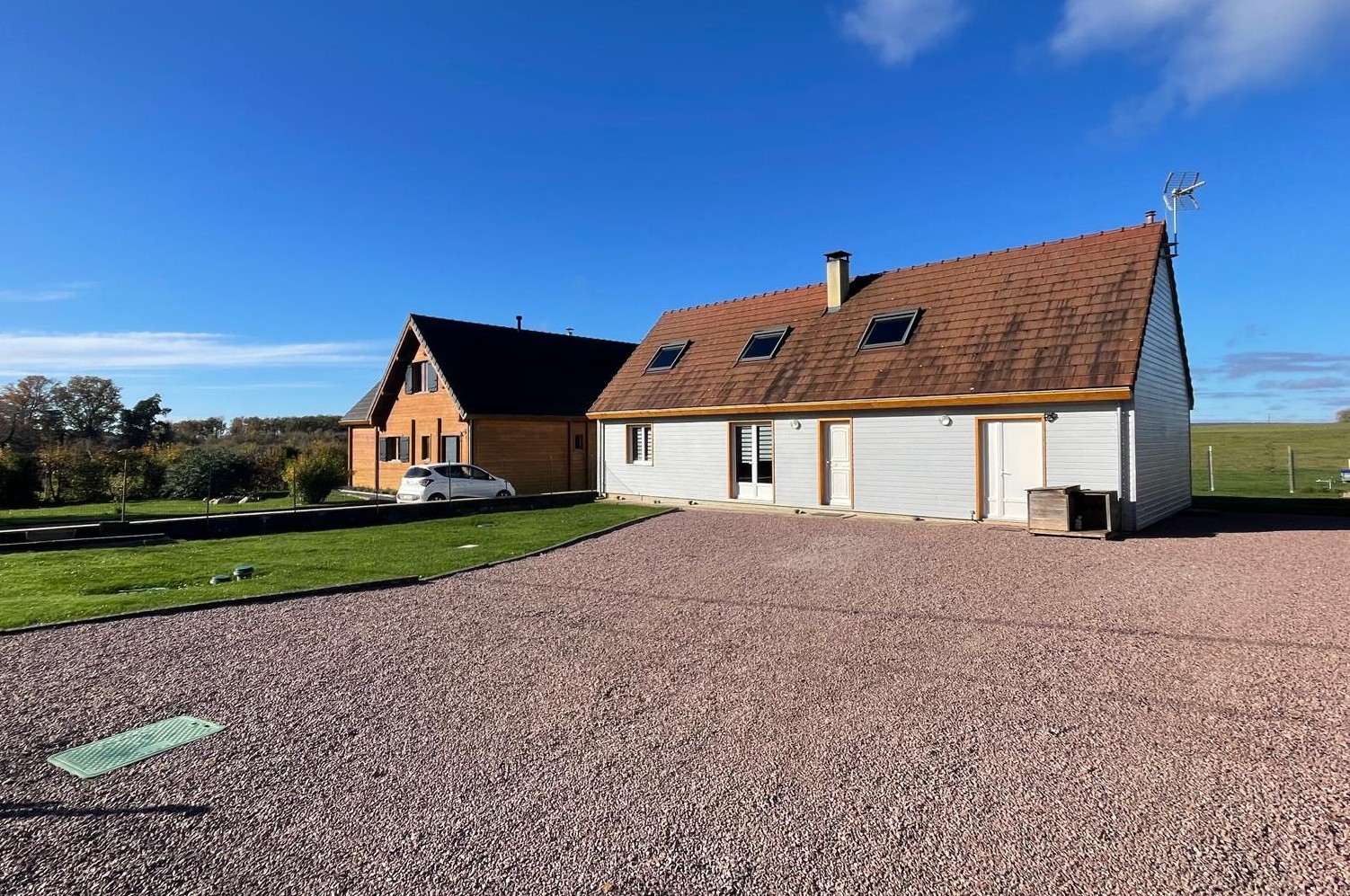 Agréable maison ossature bois offrant 99,47m² habitables avec dépendance