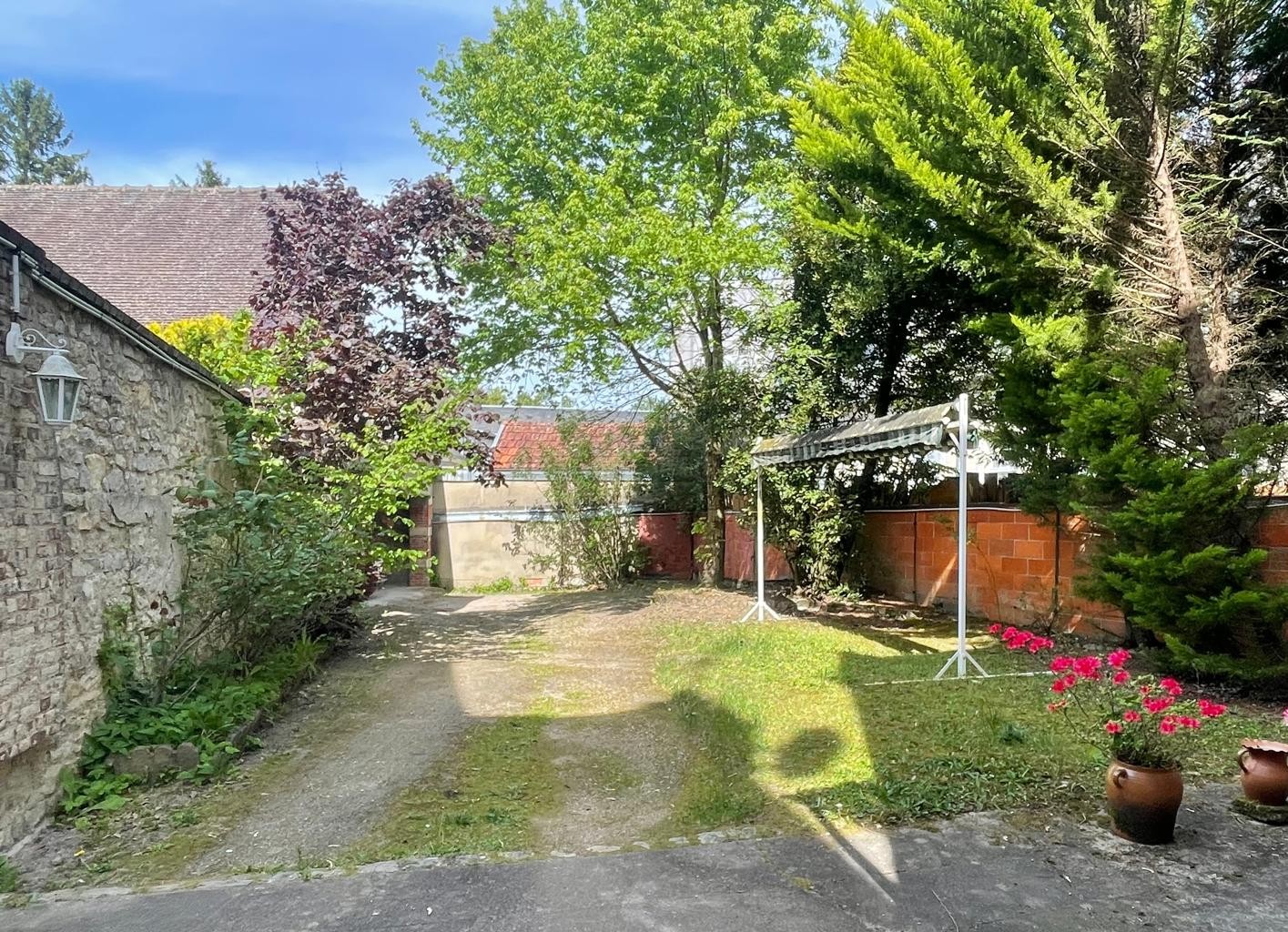 Belle maison de famille du XXème siècle offrant 160m² avec jardinet cour intérieure